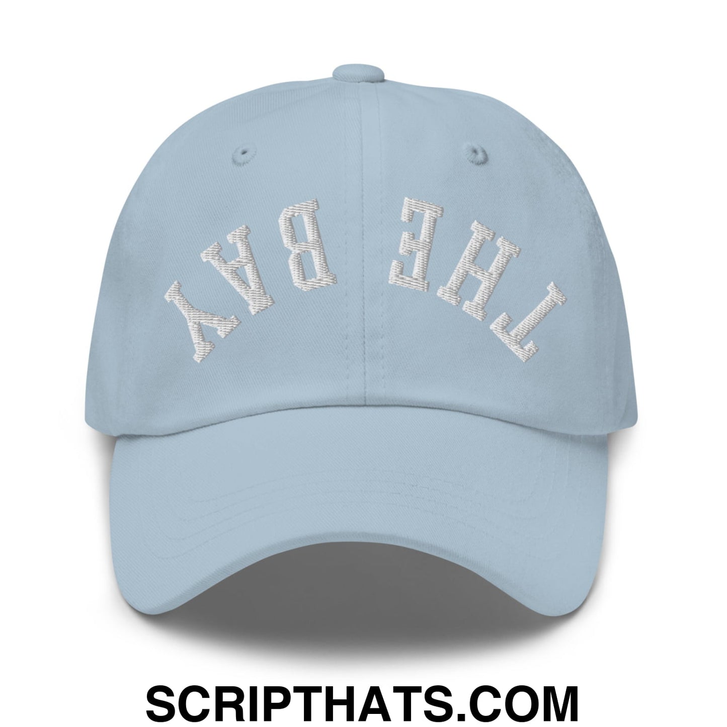 Light blue unstructured dad hat with white embroidered the bay arch design called upside down the bay embroidered hat