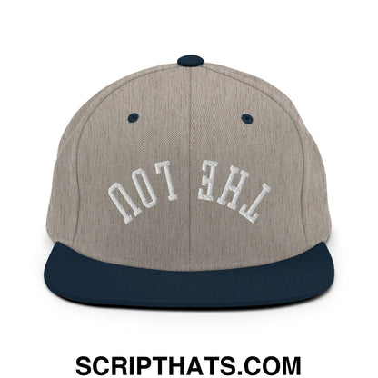 Gray and navy blue snapback cap with white embroidered the lou text and a flat bill brim in upside down design