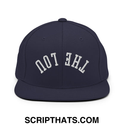 Navy blue snapback cap with white arched the lou embroidery and a flat bill brim in upside down style
