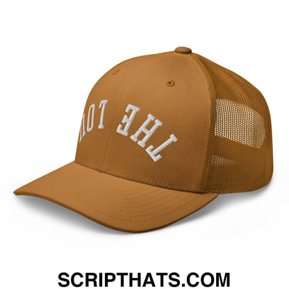 Tan mesh trucker hat with white embroidered the and not lettering in an arched design from upside down the lou collection