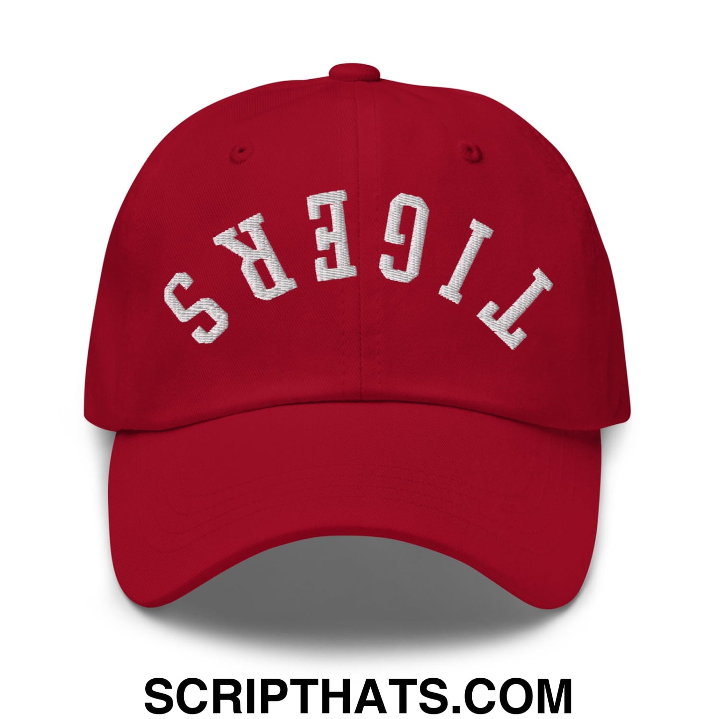Red unstructured dad hat with white embroidered tigers lettering in an arched design