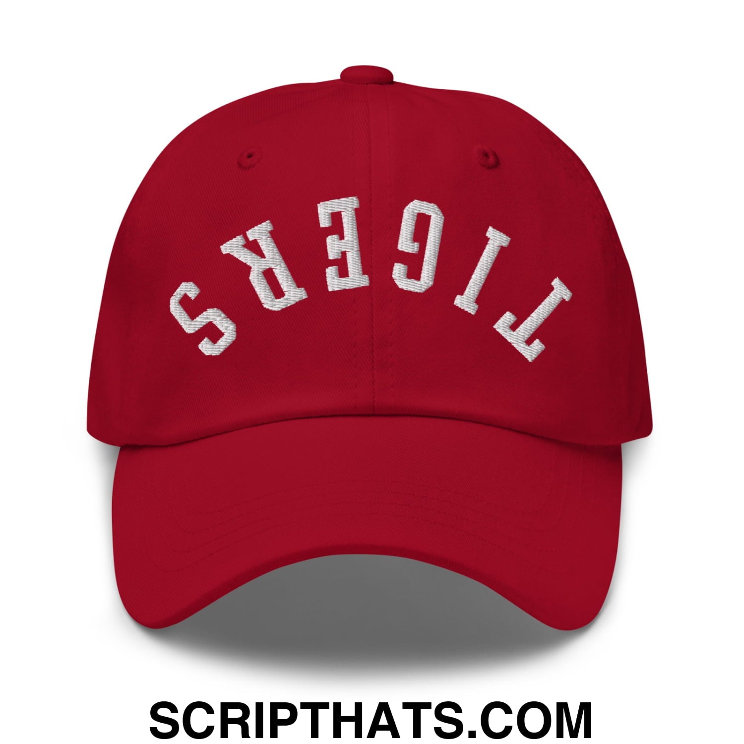 Red unstructured dad hat with white embroidered tigers lettering in an arched design