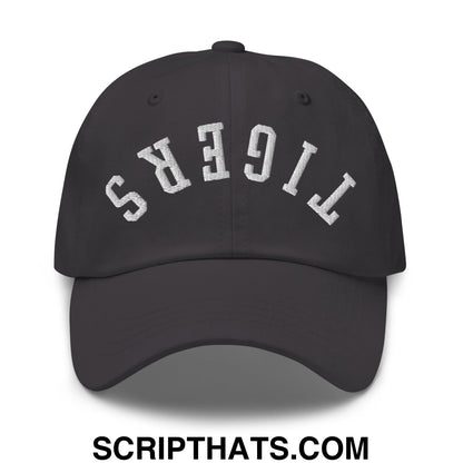 Black unstructured dad hat with white embroidered tigers lettering in an arched design called upside down tigers embroidered hat