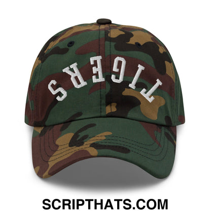 A camouflage unstructured dad hat with tigers embroidered in white arched lettering on the front