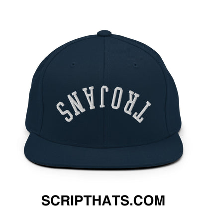 Navy blue snapback hat with white embroidered trojans lettering in an arched design and flat bill brim