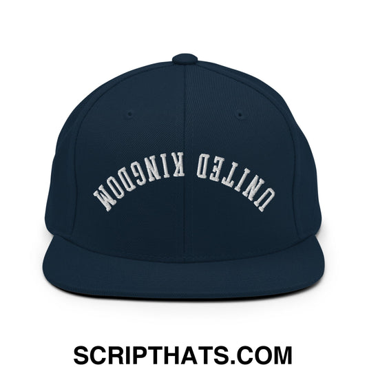 Navy blue snapback hat with white embroidered united kingdom text in an arched design and flat bill brim