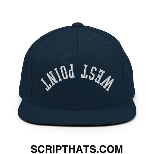Navy blue snapback hat with white embroidered west point lettering and flat bill brim in classic arched design