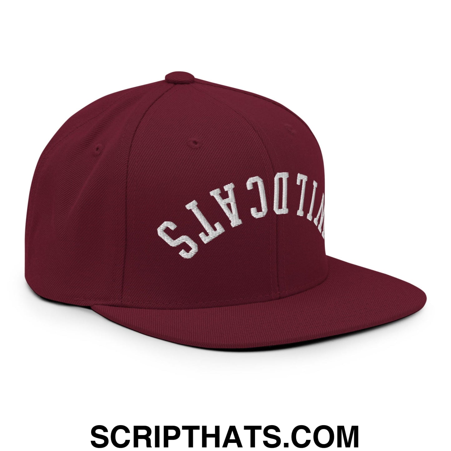 Maroon snapback cap with white embroidered wildcats lettering and flat bill brim in upside down design