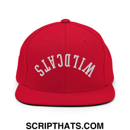 Red snapback hat with white embroidered wildcats lettering in an arched design and flat bill brim