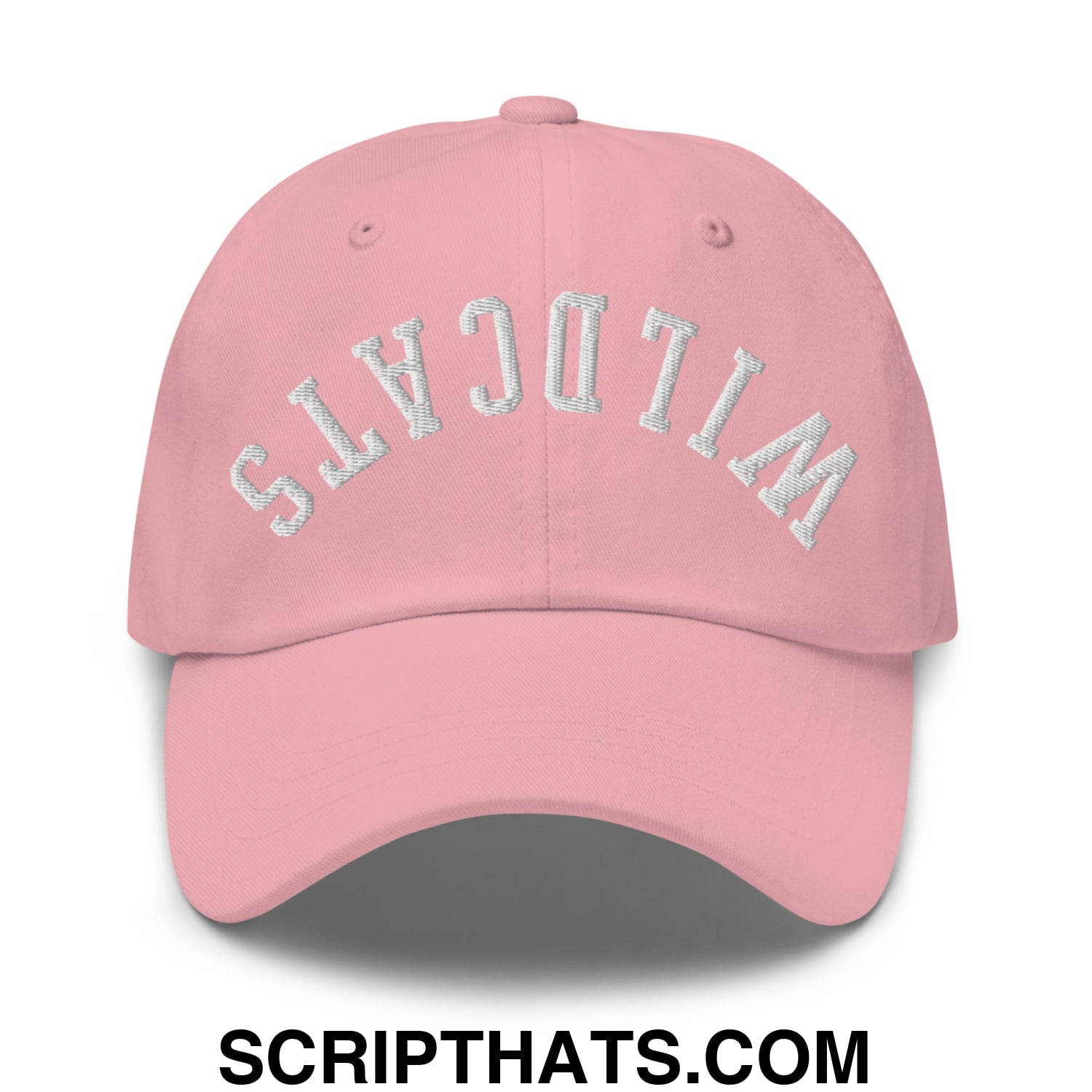 A soft pink unstructured dad hat with wildcats embroidered in silver arched font on the front