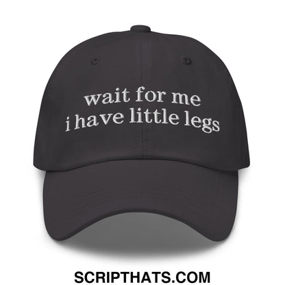 Black unstructured dad hat with white embroidered wait for me i have little legs text on front panel