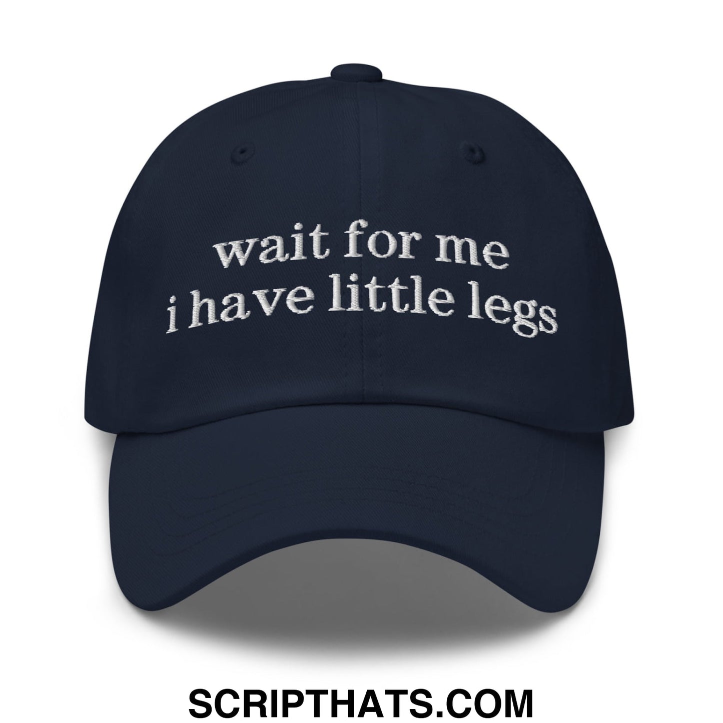 Navy blue unstructured dad hat with white embroidered wait for me i have little legs text on the front