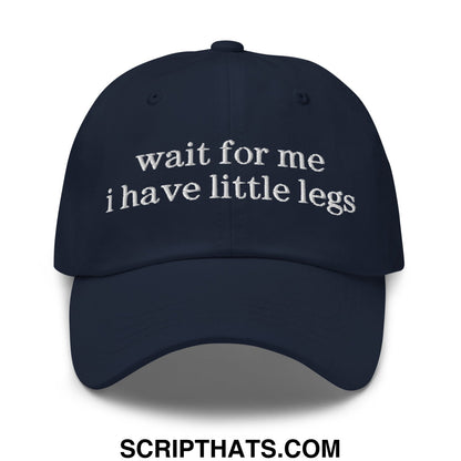 Navy blue unstructured dad hat with white embroidered wait for me i have little legs text on the front