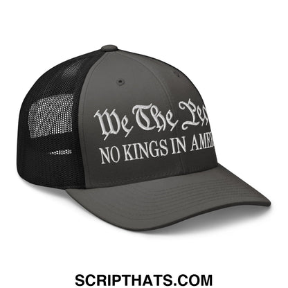 Black mesh trucker hat with white embroidered we the leg no kings in amer text on front panel for casual wear