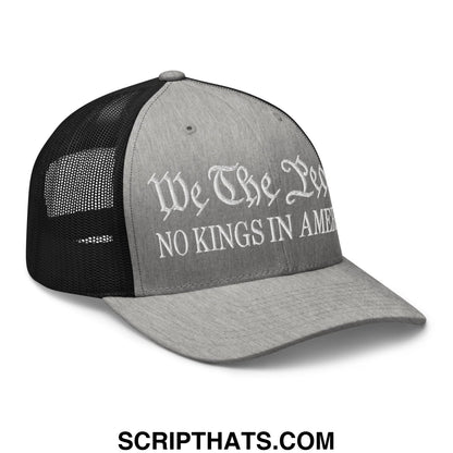 Gray and black mesh trucker hat with white embroidered we the people no kings in america text on front panel