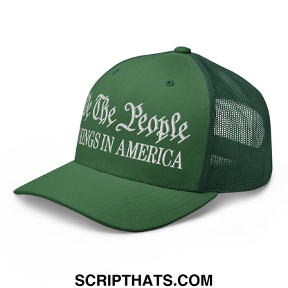 Dark green mesh trucker hat with white embroidered text all the people kings in america from we the people collection