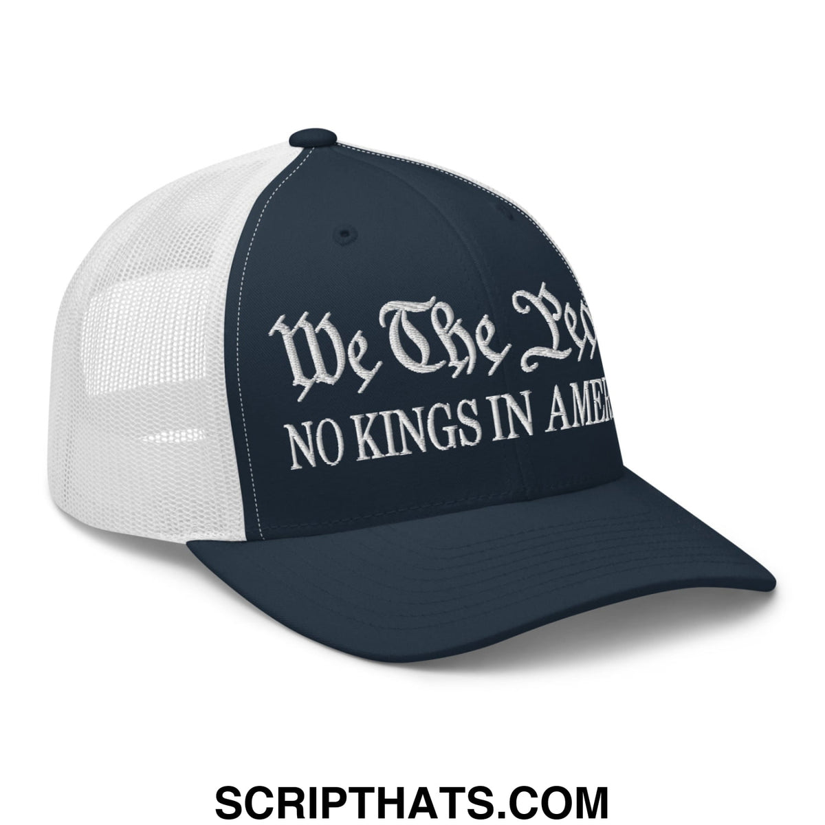 Navy blue and white mesh trucker hat with embroidered gothic script reading we the leg no kings in amer