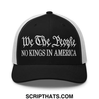 Black and white mesh trucker hat embroidered with we the people no kings in america gothic script text