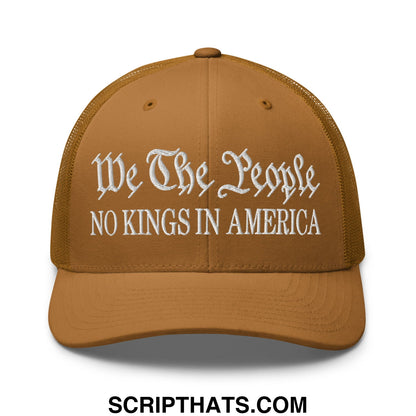 Tan mesh trucker hat with white embroidered we the people script and no kings in america block text on front panel