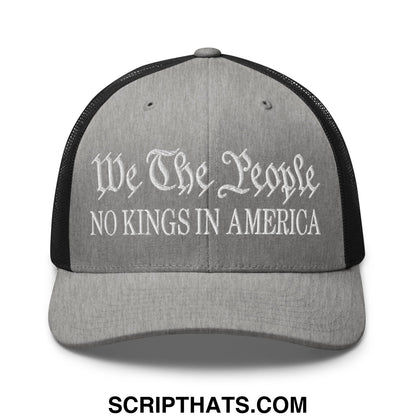 Gray mesh trucker hat with white embroidered we the people no kings in america text and black mesh back
