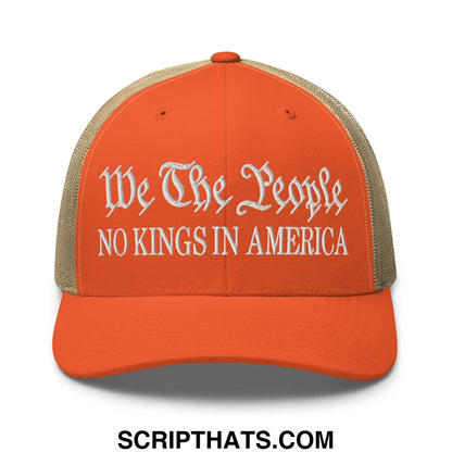 Orange and beige mesh trucker hat with white embroidered we the people no kings in america text in script font