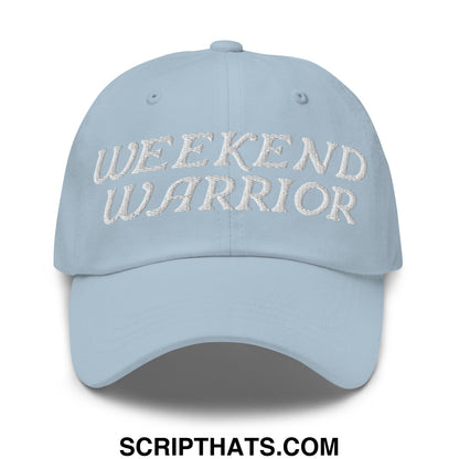 Light blue unstructured dad hat with weekend warrior embroidered in white thread across the front