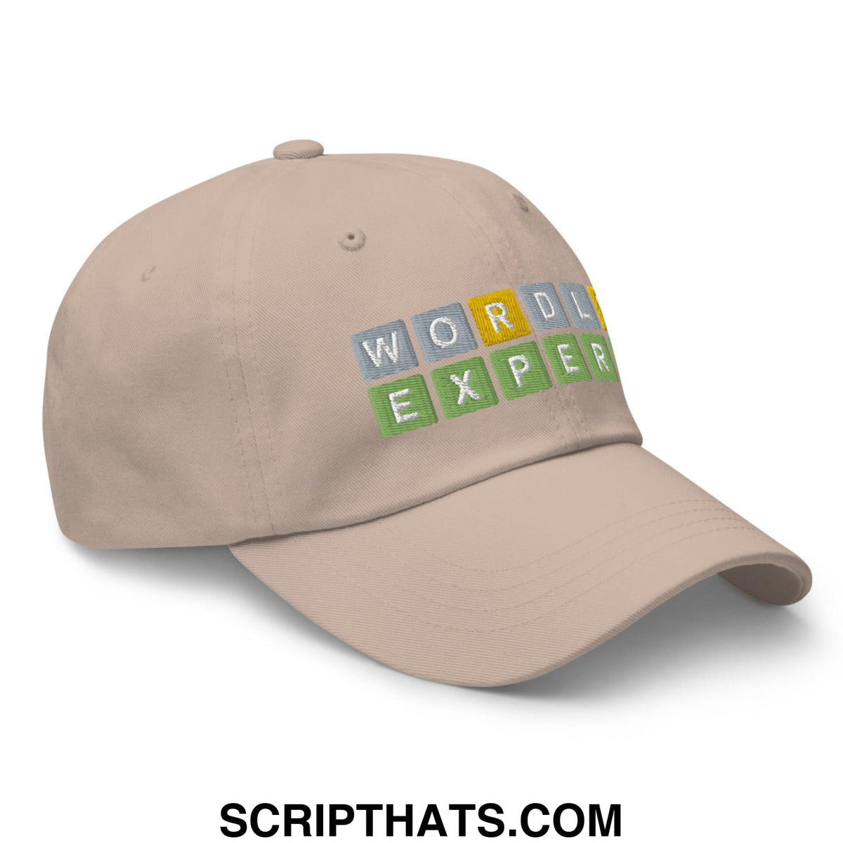 Beige Wordle Expert dad hat with colorful block-style embroidered lettering on a comfortable cotton baseball cap