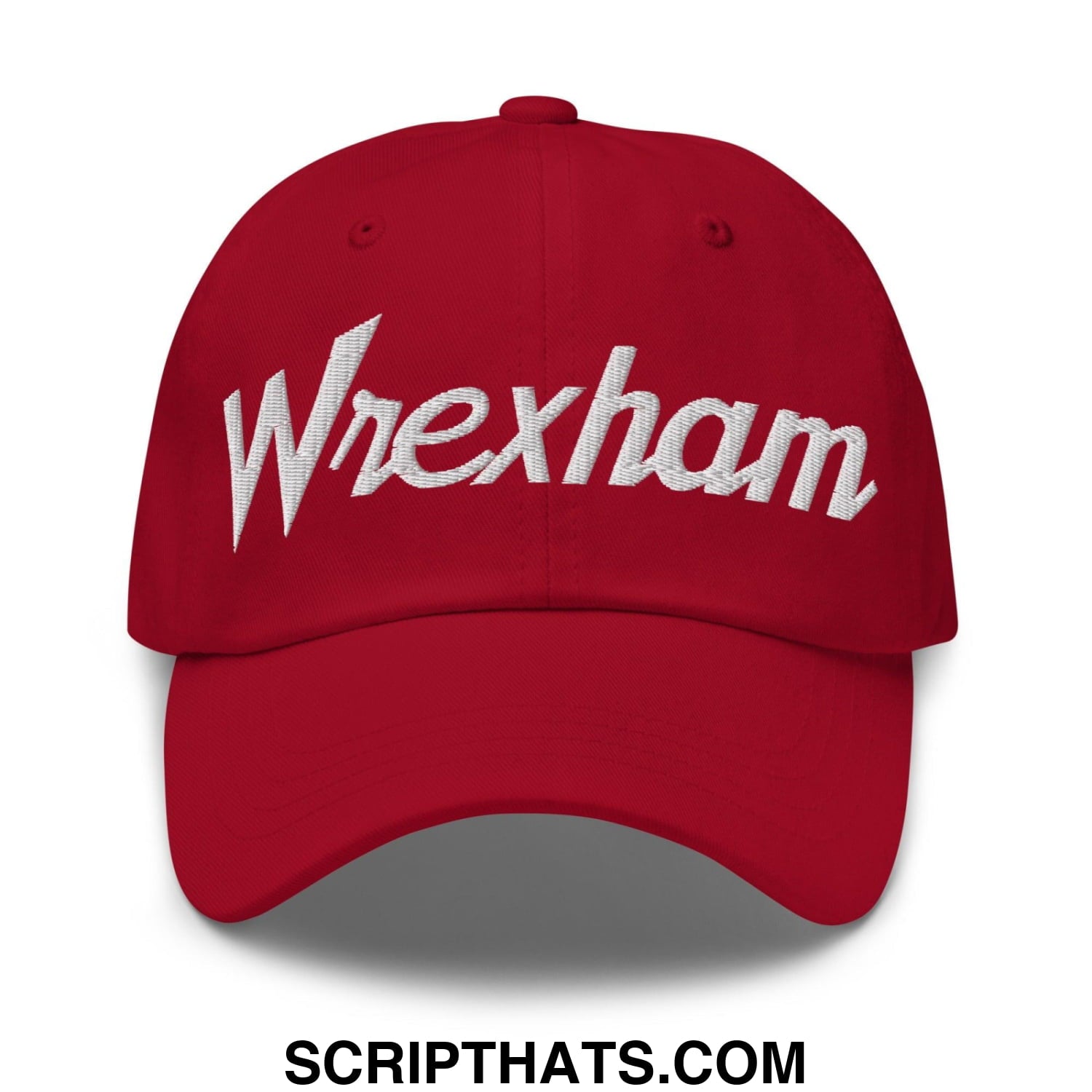 Red baseball dad hat with white embroidered wrexham vintage sports script on the front panel
