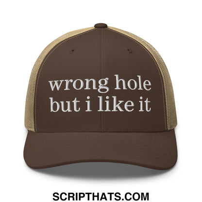 Brown and tan mesh trucker hat embroidered with white text wrong hole but i like it for casual wear