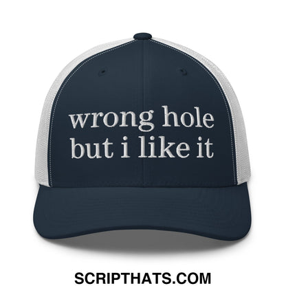 Navy blue and white mesh trucker hat with embroidered text wrong hole but i like it in a casual style