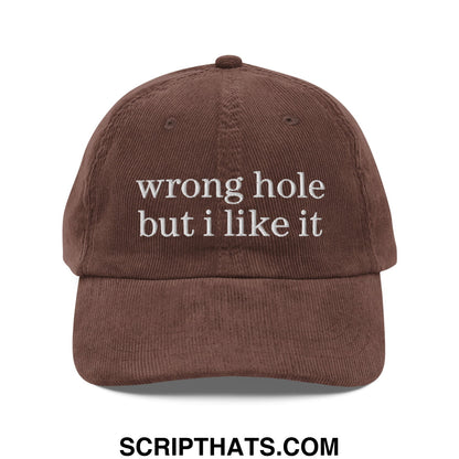 Brown corduroy baseball cap with white embroidered text wrong hole but i like it in an unstructured dad hat design