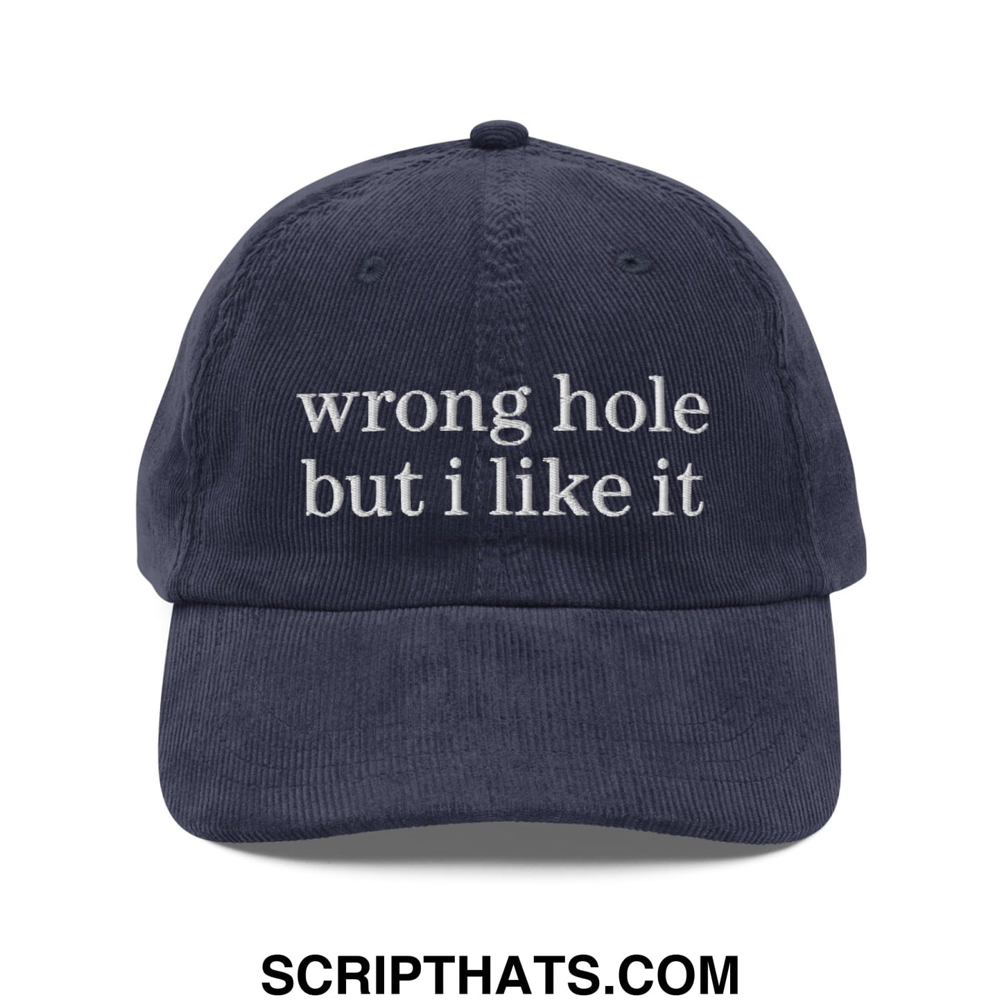 Navy blue corduroy unstructured dad hat with white embroidered text reading wrong hole but i like it