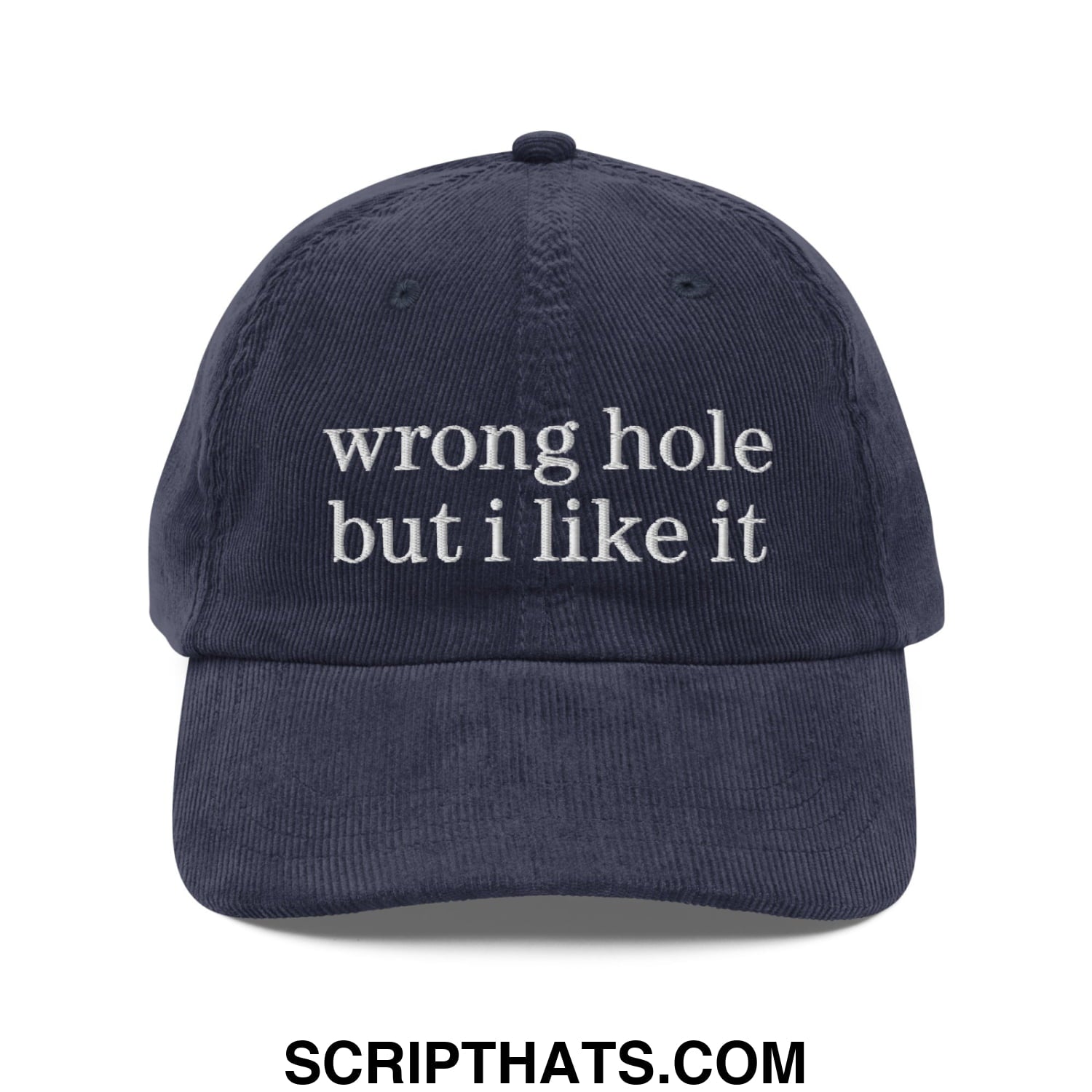 Navy blue corduroy unstructured dad hat with white embroidered text reading wrong hole but i like it