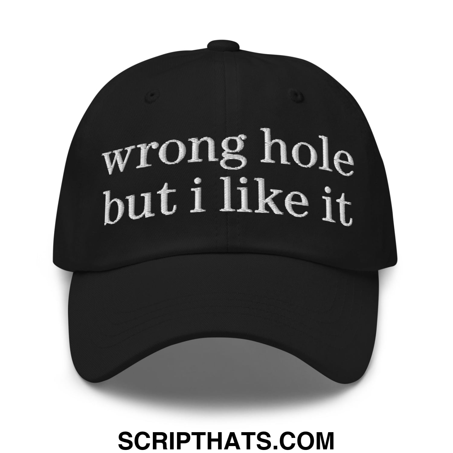 Black unstructured dad hat with white embroidered text reading wrong hole but i like it