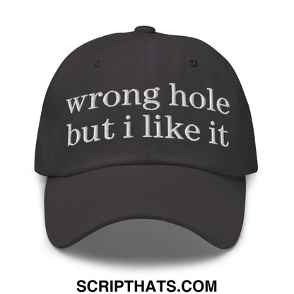 Black unstructured dad hat with white embroidered text wrong hole but i like it for casual wear