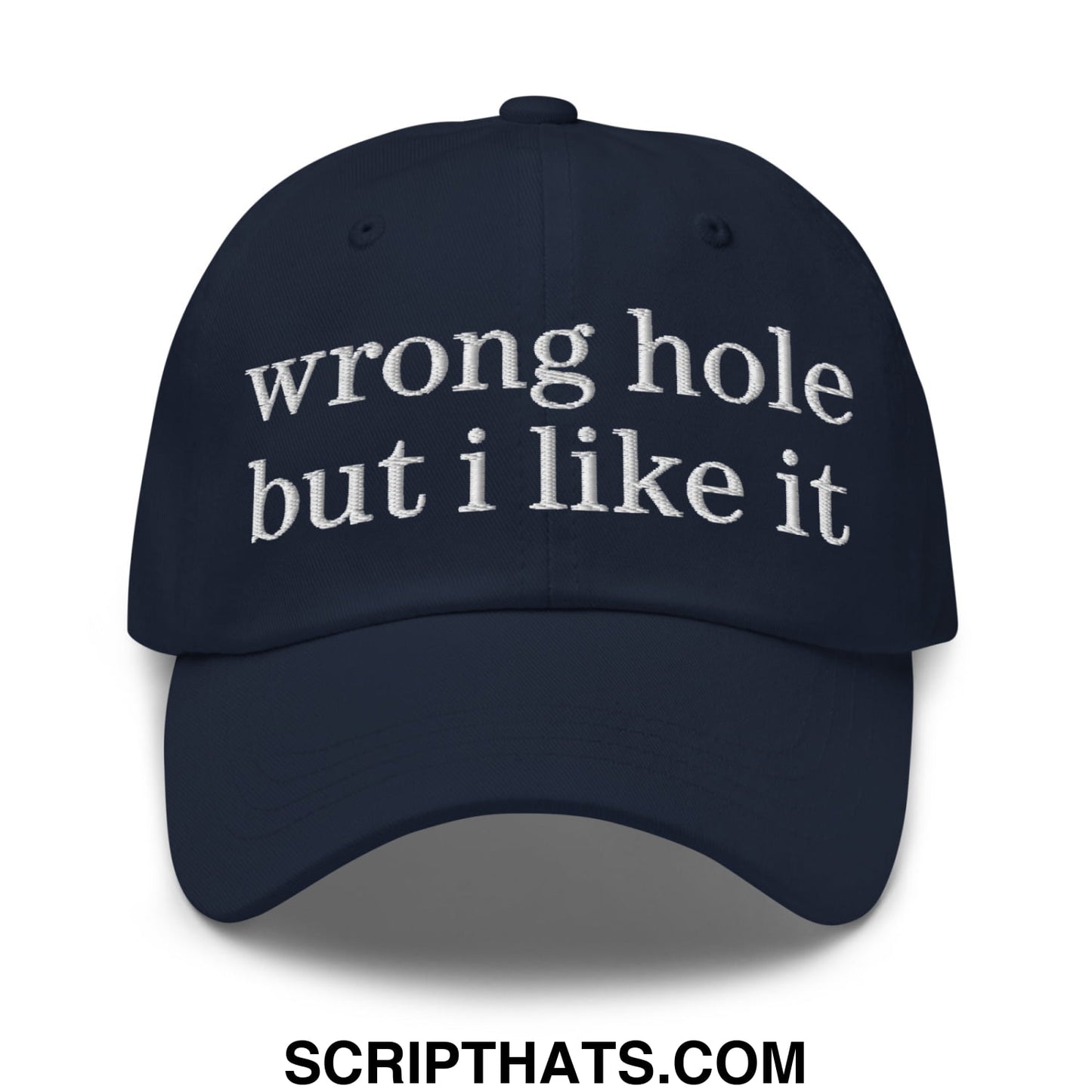 Navy blue unstructured dad hat with white embroidered text wrong hole but i like it perfect for casual wear